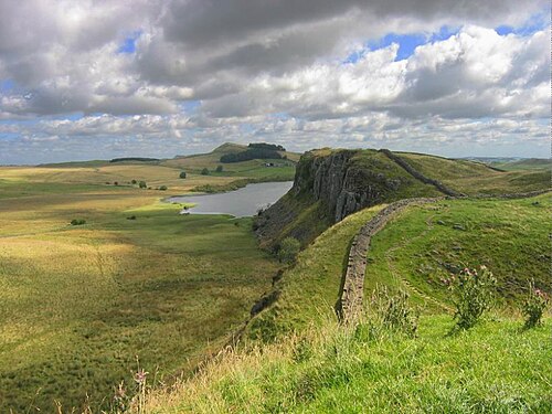 Hadrian's Wall running along the Whin Sill above Crag Lough