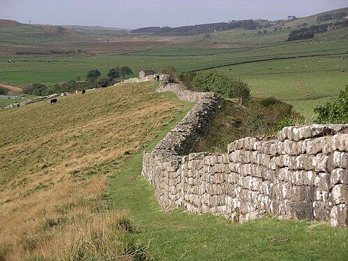 Hadrian's Wall snaking across the landscape near Greenhead Lough